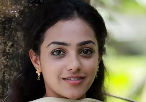 Nithya Menon without makeup in a simple top