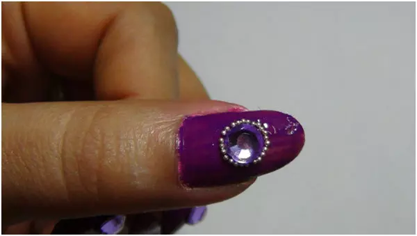 Studded Purple Nail Art Tutorial - Step 4: Stick Caviar Beads Surrounding The Rhinestones