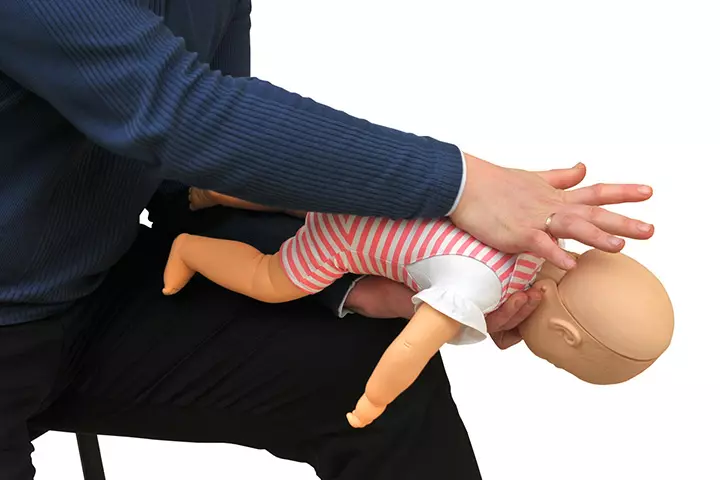 Back blows for a choking baby