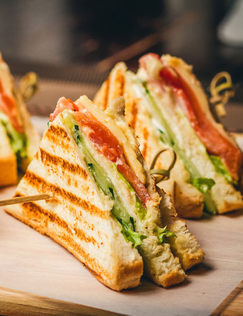 Vegetable grilled sandwich is a common vegetarian breakfast food Vegetable grilled sandwich is a common vegetarian breakfast food
