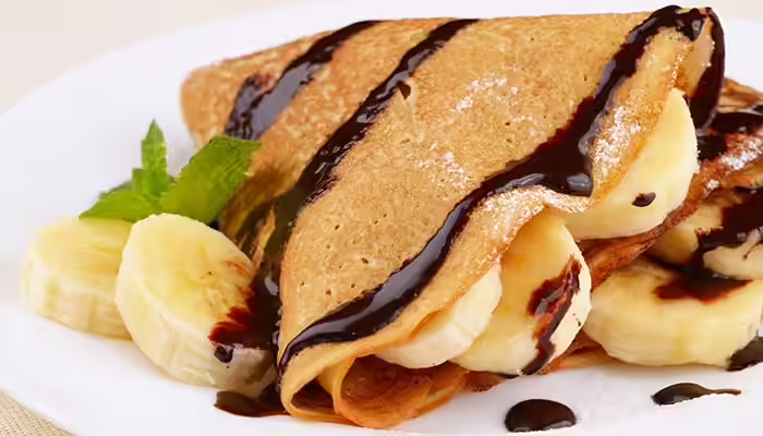 Sanjeev Kapoor Recipes For Kids - Carmelized Banana Crepes Image: Shutterstock