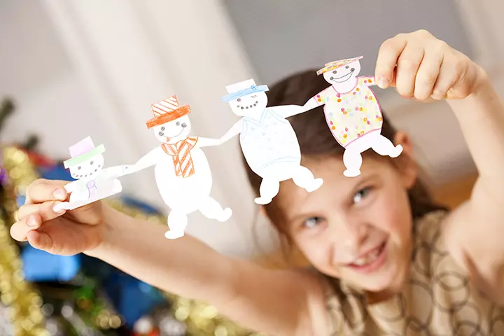 Indoor Winter Activities For Kids - Make Newspaper Snowman Using Garlands Of Small Snowmen