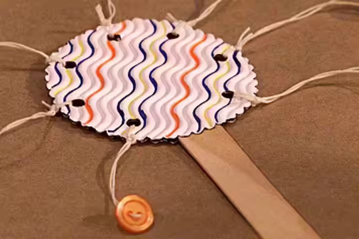 New Year Crafts For Kids - Button Noisemaker New Year Crafts For Kids - Button Noisemaker