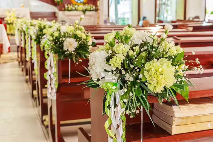 An Assortment Of Blossoms Wedding-Pew-Decorations-with-An-Assortment-Of-Blossoms