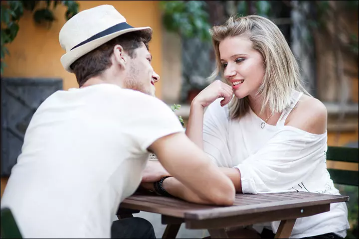 young-couple-sitting-at-the-table