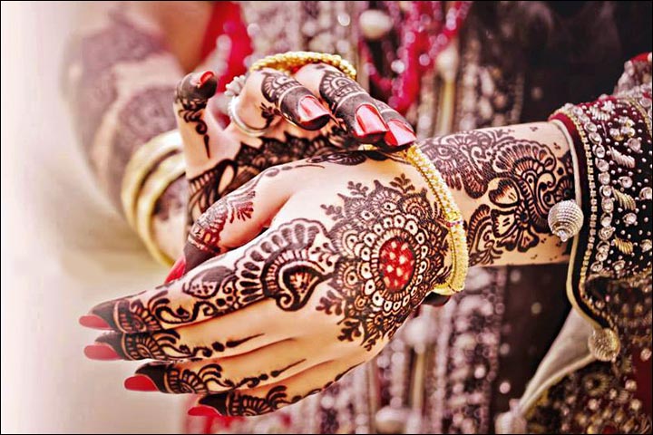 Pakistani Bridal Mehndi Designs - Spherical sun design with a touch of red