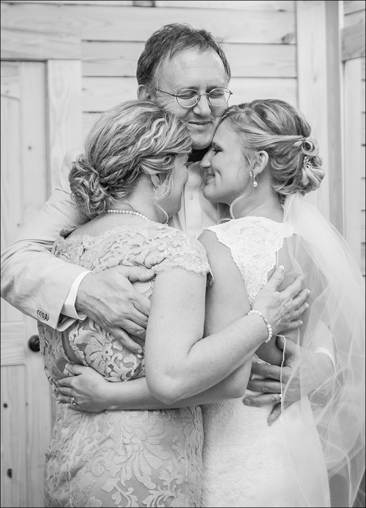 Group-Hug-–-Bride-&-Parents-must-have-wedding-photos-you-dont-want-to-miss