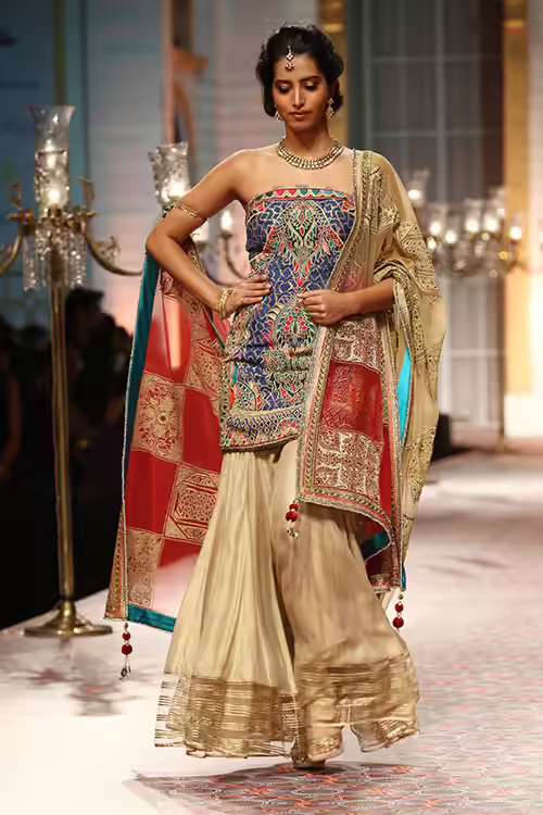 Embroidered sharara with motifs salwar kameez design Embroidered sharara with motifs salwar kameez design