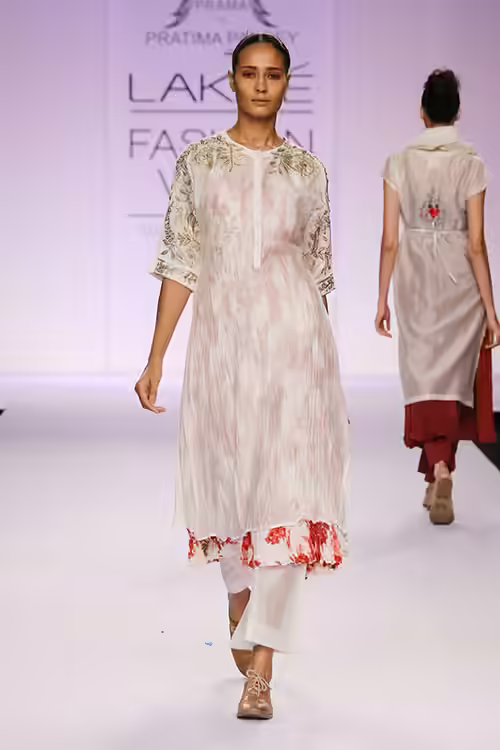 White zardozi embellished salwar kameez design White zardozi embellished salwar kameez design