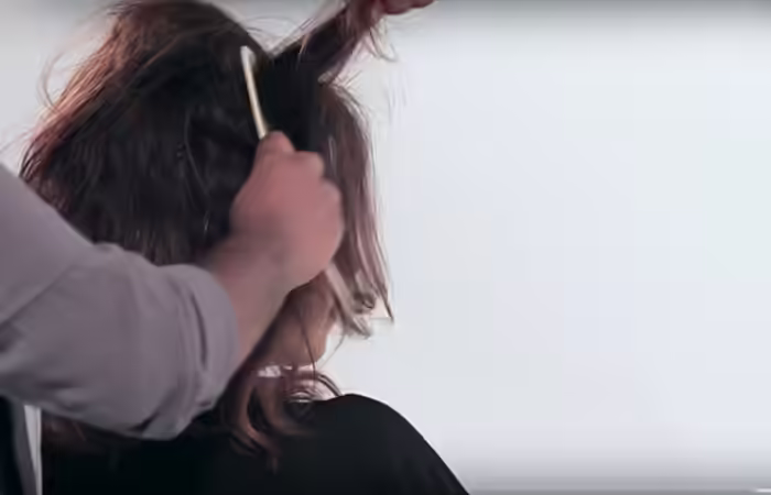 How To Do A Messy Bun - Step 3 Tease-your-hair-to-create-volume
