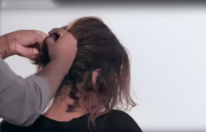 How To Do A Messy Bun - Step 7 Tie-a-bun-at-the-nape-of-your-neck