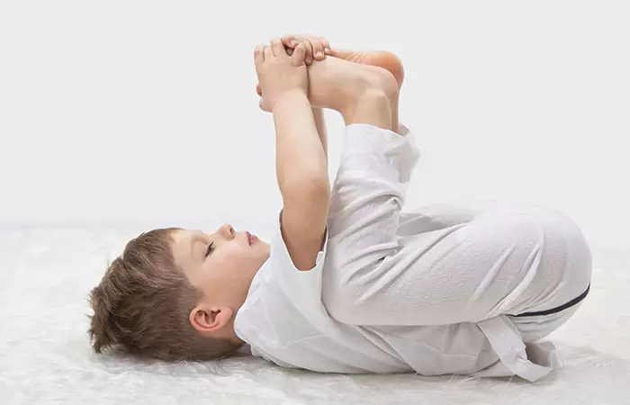 3. Ananda Balasana (Happy Baby Pose)