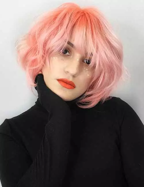 16. Neon Peach Layered Bob