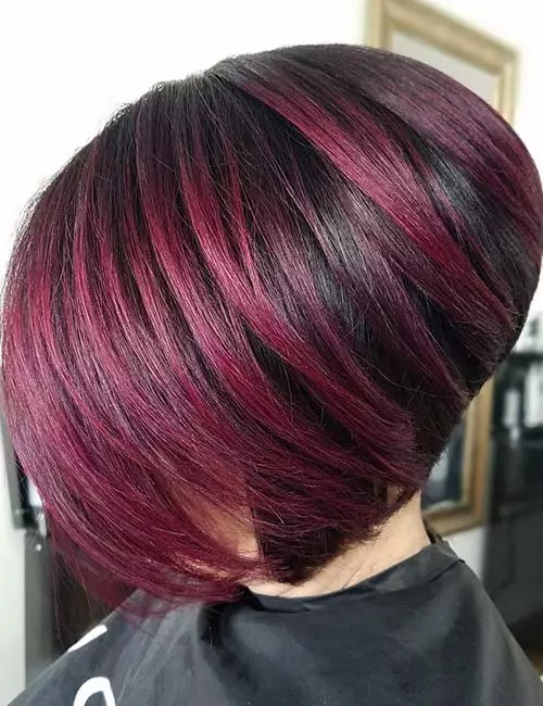 6. Short And Stacked With Purple Highlights