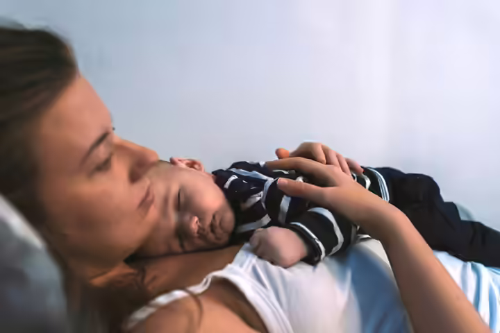 Why Co-Sleeping While Holding Your Baby Could Be Risky? Why Co-Sleeping While Holding Your Baby Could Be Risky?