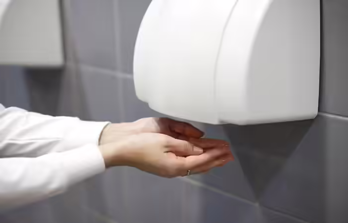 Drying Hands With A Hand Dryer