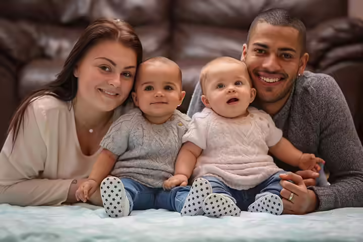 Identical Twins Take After Different Parents Identical Twins Take After Different Parents
