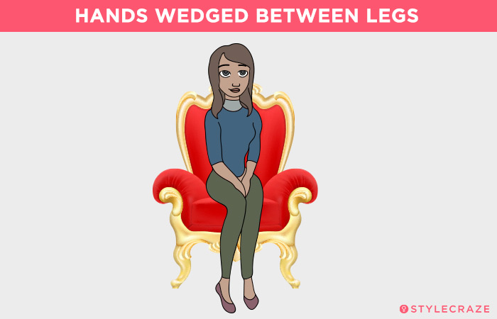 Hands Wedged Between Legs