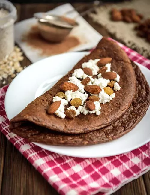 4. Chocolate Oat Pancake With Ricotta And Nuts