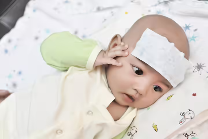Damp cloth on the forehead