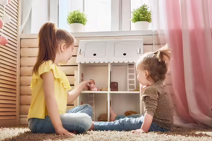 Why Your Baby Doesn't Like Dolls, According To Science