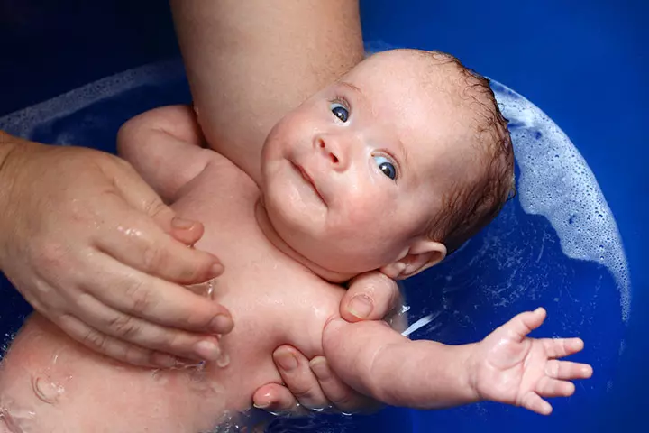 Giving The First Bath