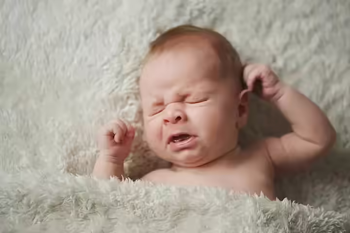 Newborn Sneezing Causes