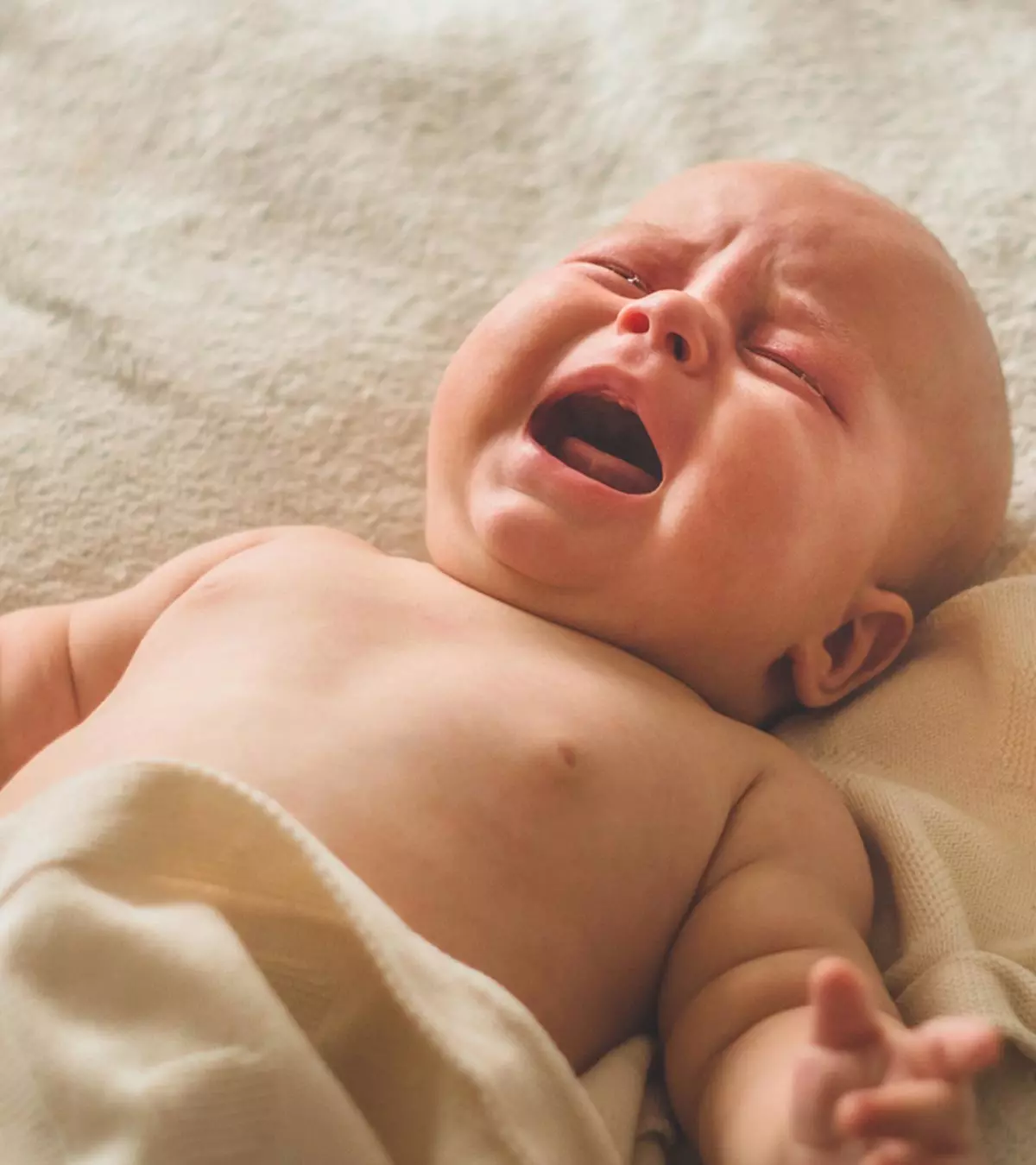 Understanding the cues of a baby crying in their sleep may help you attend to them.