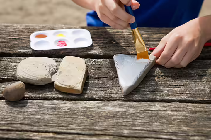 Doodling on rock painting ideas for kids