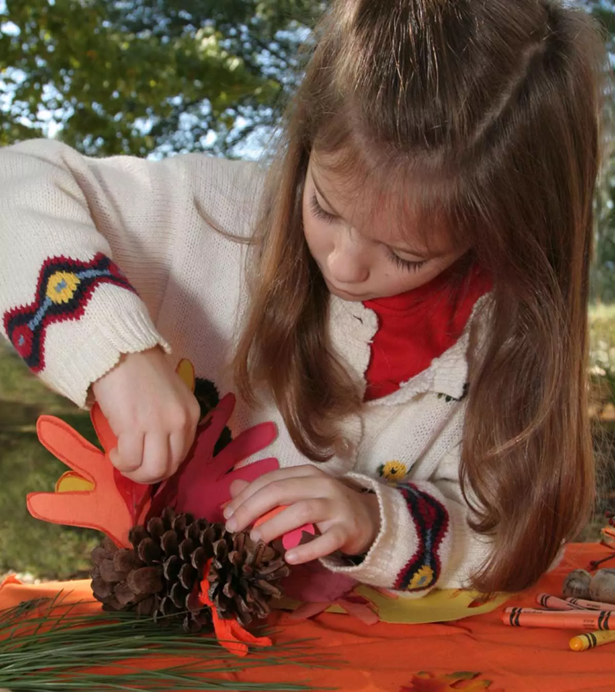 Introduce your child to pinecone activities, helping them appreciate nature and its importance.