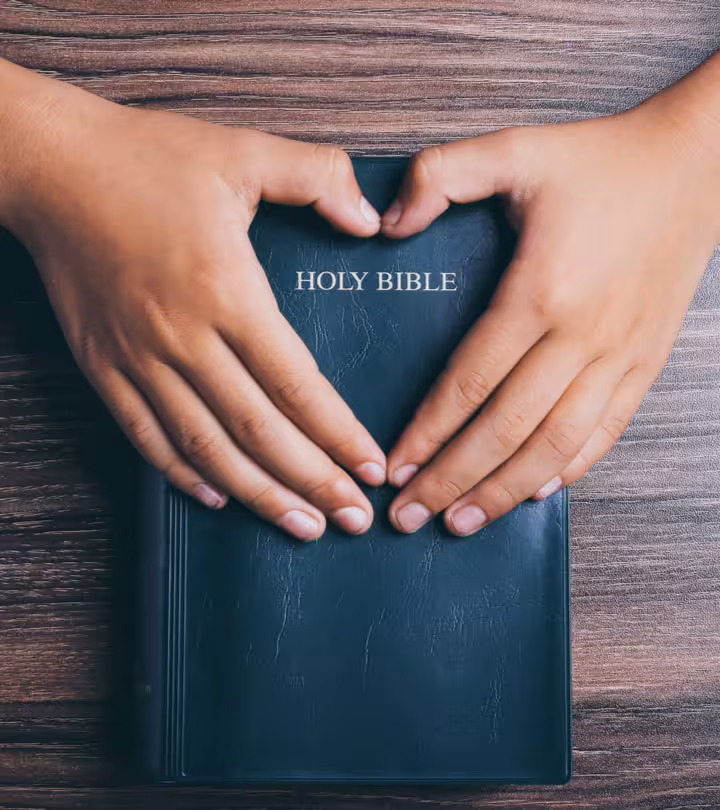 holy-bible-heart-shape-hands-on-1137646790
