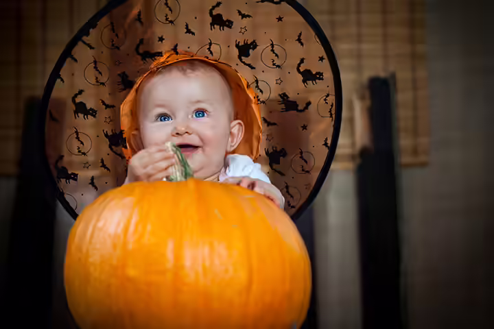 Halloween themed baby in a pumpkin pictures Halloween themed baby in a pumpkin pictures