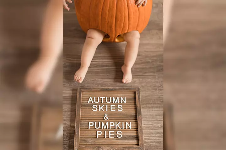 Cute message with baby in a pumpkin pictures