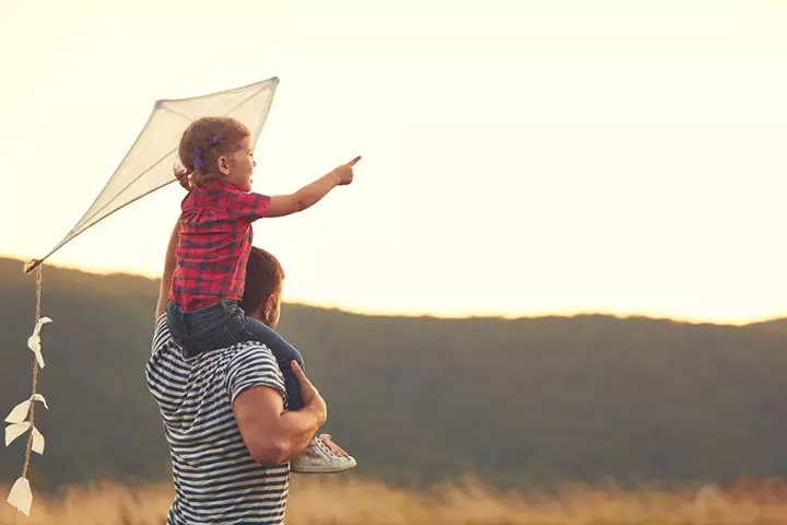 Flying a kite and outdoor activities for babies