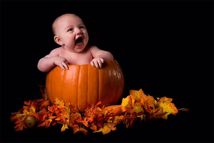 Add autumn leaves baby in a pumpkin pictures Add autumn leaves baby in a pumpkin pictures