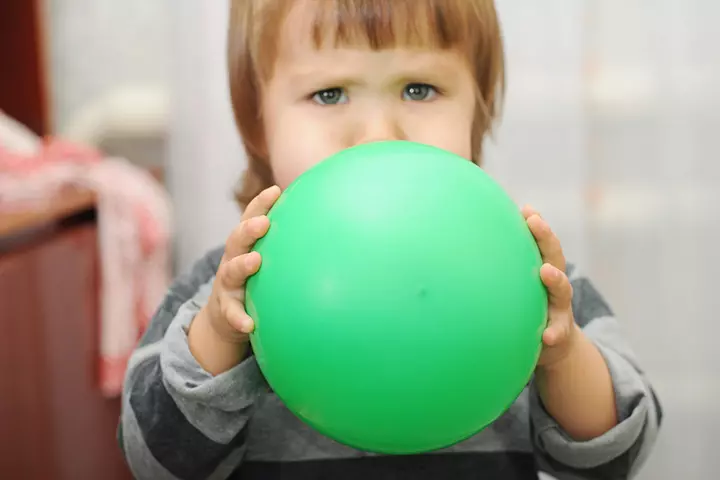 Inflating balloons as breathing exercises for kids