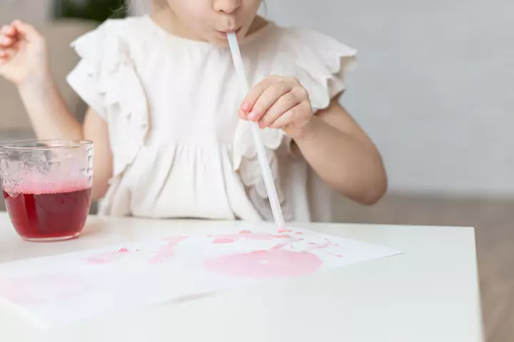 Straw blow painting as breathing exercises for kids