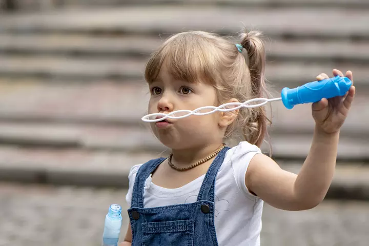 Blowing bubbles as breathing exercises for kids