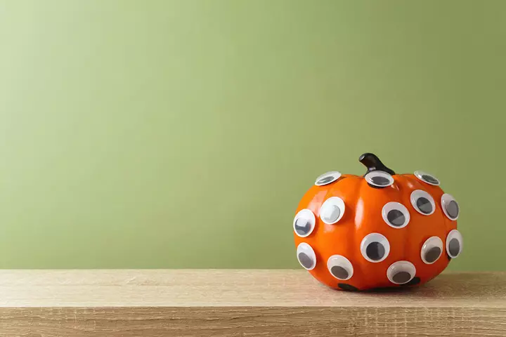 Googly eyed pumpkin painting idea for kids