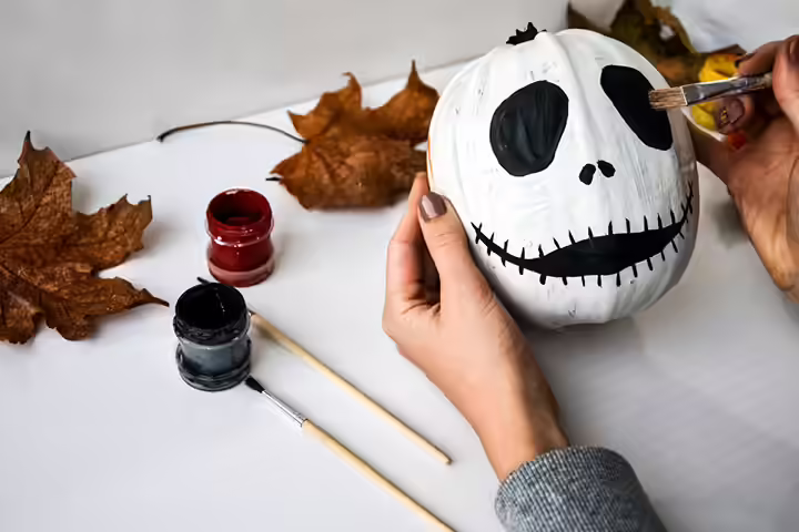 Jack Skellington-inspired pumpkin painting idea for kids Jack Skellington-inspired pumpkin painting idea for kids