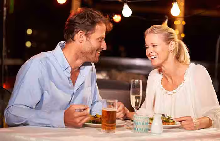 Aquarius and Aries couple talking on a fun date