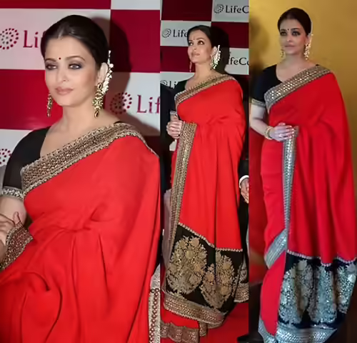 Aishwarya Rai in a blood red georgette saree with black kundan blouse Aishwarya Rai in a blood red georgette saree with black kundan blouse