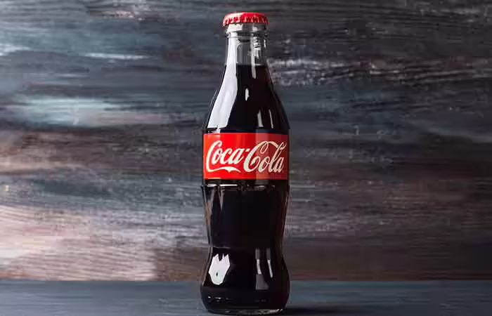 Coca-Cola to Vomit in Hindi