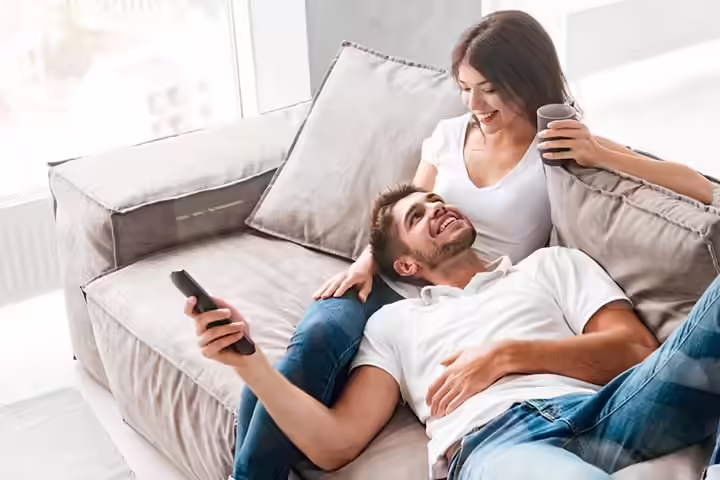 Couple relaxing at home