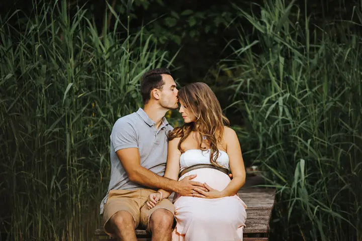 Forehead Kiss With Baby Bump