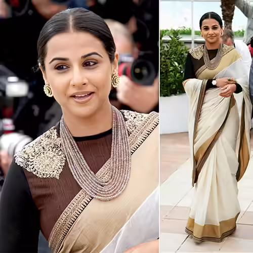 Vidya Balan in an off-white cotton saree with black full sleeves embroidered blouse Vidya Balan in an off-white cotton saree with black full sleeves embroidered blouse