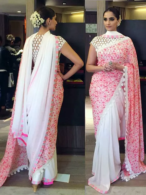 Sonam Kapoor in a peach and pink georgette saree with multi work blouse