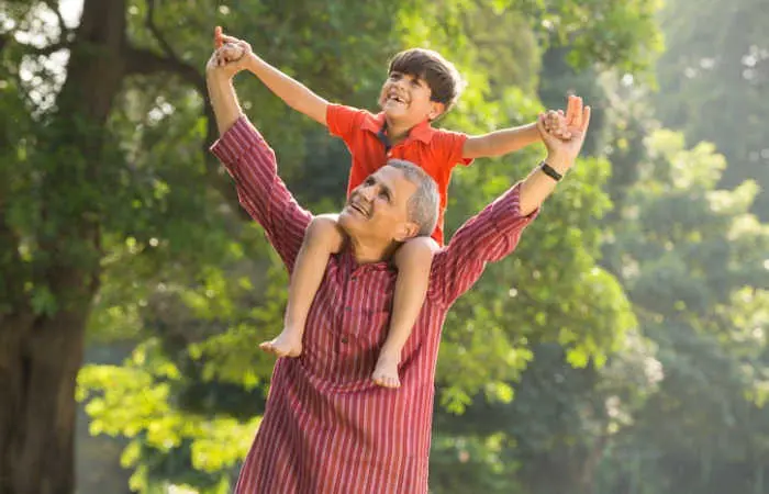 grandfather-and-his-grandson-outdoors-stock-photo-picture-id1218868394