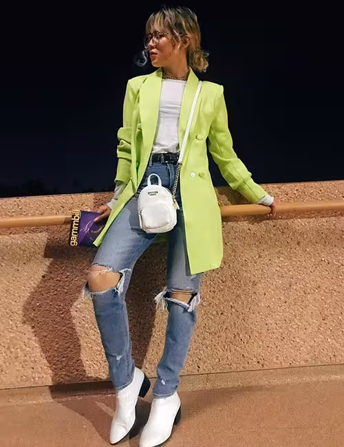 Distressed jeans and neon trench coat as a hipster outfit idea Distressed jeans and neon trench coat as a hipster outfit idea