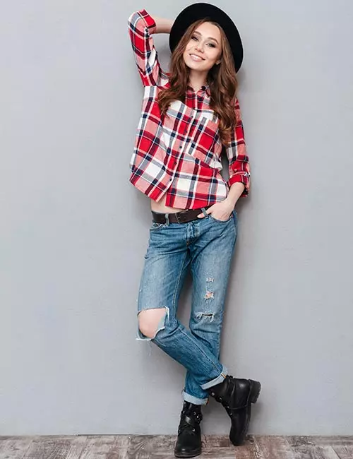 Plaid shirt and distressed jeans as a hipster outfit idea